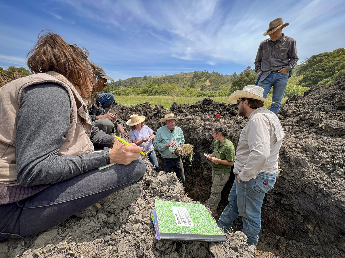 Wendell Gilgert describing soil conditions to TomKat Ranch staff