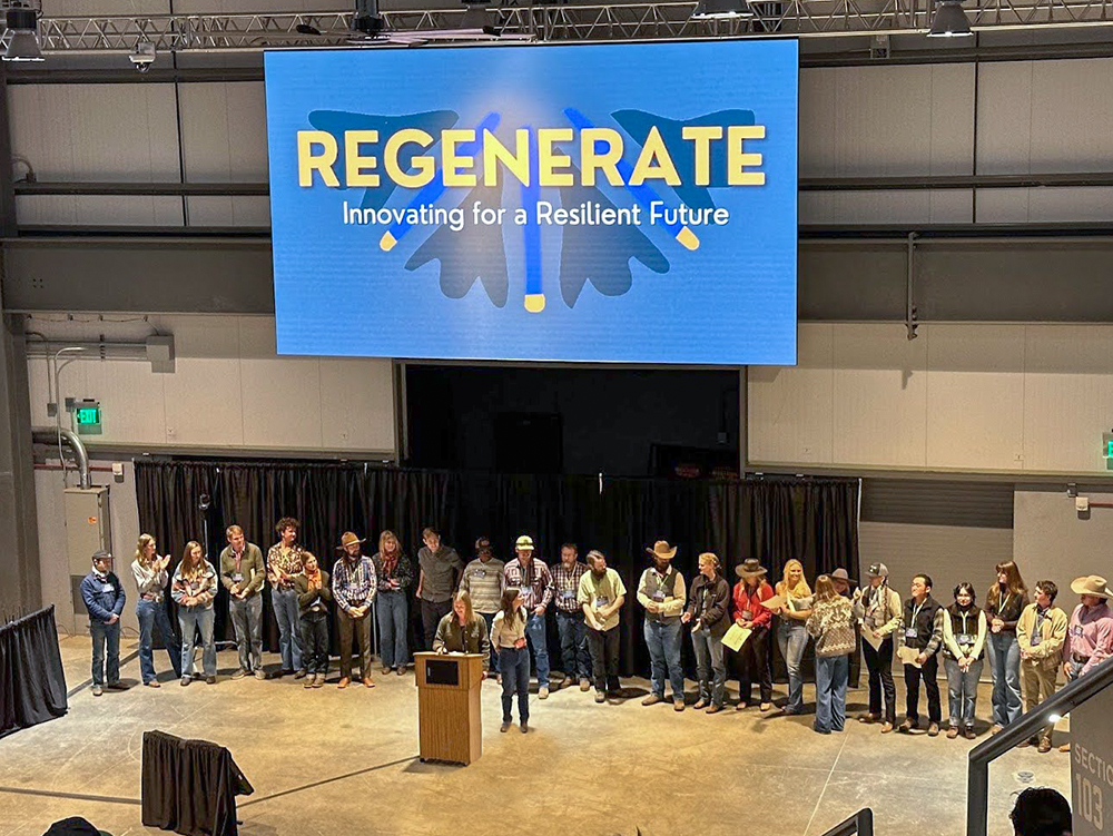 Participants-turned-graduates in Quivira Coalition’s New Agrarian Program take the stage at Regenerate 2024.